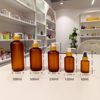 Bouteille en plastique ronde Boston populaire avec pompe en bambou pour cosmétiques, contenant givré pour gel douche, emballage 500 ml, bouteille PET