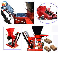 Machine de fabrication de briques en terre cuite emboîtables QTC2-25 Eco Brava avec PLC, pression hydraulique de 3-5 tonnes, boîte de vitesses et roulement de noyau inclus