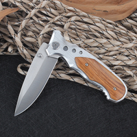Couteau de Survie Pliant Populaire en Stock, Design Argent Aluminium et Bois