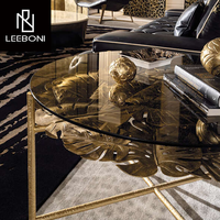 Pièce de table centrale nordique moderne et simple de luxe Table basse centrale latérale en laiton avec dessus en verre