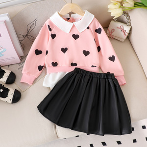 2025 nouveau haut avec imprimé coeur pour l'automne et l'hiver, deux sweats à manches longues et une <span class=keywords><strong>jupe</strong></span> <span class=keywords><strong>en</strong></span> <span class=keywords><strong>cuir</strong></span> - Product Image 1