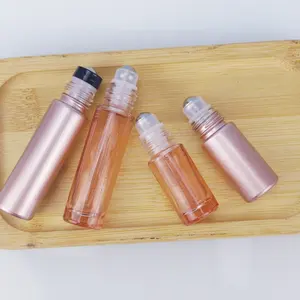 Em estoque rolo de óleo essencial de vidro vazio de 5ml 10ml cor ouro rosa em garrafa com o rolo de aço