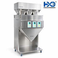 Machine de remplissage robuste à triple tête 5000g avec conception à triple trémie en acier inoxydable pour granulés, poudres et matériaux secs en vrac