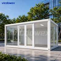 VICDOWEX - Showroom en conteneur préfabriqué - Mur-rideau en verre - Design contemporain - Modulaire - Préfabriqué - Pour immeuble de bureaux - Entrepôt