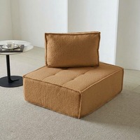 Canapé individuel cube minimaliste, unité d'assise modulable, fauteuil lounge moderne pour appartement et coin détente