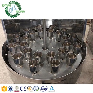 Laveuse semi-automatique rotative à 24 têtes pour bouteilles de bière et de vin, capacité 2000 bph, avec pulvérisation d'eau et chauffage - Product Image 4