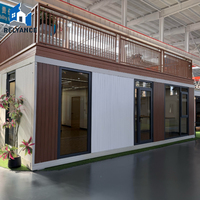 Maison conteneur extensible tout acier, en promotion, avec structure de transport préfabriquée, maison d'hôtes mobile, garage, terrasse au deuxième étage, moderne