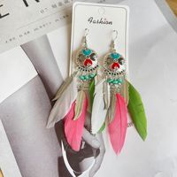 Europäisch-Amerikanische Bohemian Hühnerfeder-Ohrringe Vintage Übertriebener Urlaubsstil Ethnischer Quasten-Ohrring Yunnan Reise-Accessoires