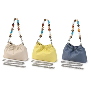 Bolso de hombro de material de piel de vaca de alta gama, botón magnético, bolso diario para mujer, bolso de hombro de color sólido - Product Image 1