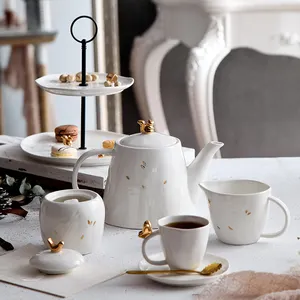 Goldenes Dekor des modernen europäischen Stils Keramik creme Zucker topf Tasse Untertasse Nachmittags tee Kaffeeset weiße Luxus-Teesets mit Teekanne