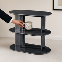 Ensemble de tables basses minimalistes à cadre métallique rond avec plateau en pierre frittée aspect marbre pour salon, chambre, hôtel, projet commercial