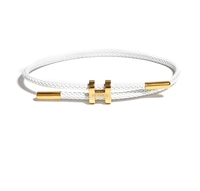 Bracelet élastique en acier titane plaqué or avec boucle en forme de H réglable pour femmes