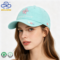 Casquette de papa vert menthe à imprimé floral, avec logo personnalisé et boutons en forme de cœur, pour un style décontracté urbain – Fabrication OEM/ODM certifiée BSCI