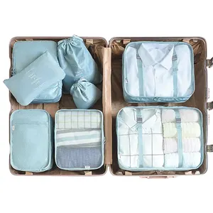 Vente en gros d'usine de sacs organisateur de voyage multifonction Ensemble de cubes d'emballage de bagages multifonctions Sacs à linge pour vêtements Paniers