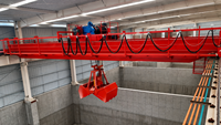 Grue à pont à double poutre de 5 à 20 tonnes avec godet de préhension pour l'entreposage et la manutention du clinker de ciment dans les cours d'usine