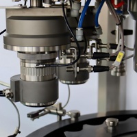 Machine de remplissage automatique d'aérosols BOV