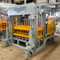 Machine de fabrication de blocs de béton creux entièrement automatique QT5-15 (blocs de pavage colorés)