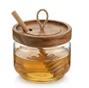 Tarro de miel transparente de calidad premium con cuchara y tapa, ideal para almacenamiento en la cocina y para servir miel, disponible para la venta. - Product Image 5