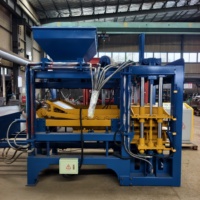 Machine de moulage de blocs entièrement automatique durable QT4-15, machine hydraulique de fabrication de briques en béton pour briqueterie moyenne