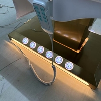 Table de massage électrique moderne dorée, lit de spa de luxe avec base dorée réglable, éclairage LED, pour hôtel, salon, usage médical, en cuir PU