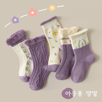 Printemps et automne nouvelles chaussettes pour enfants accessoires filles chaussettes tube moyen chaussettes souples Jacquard tridimensionnelles