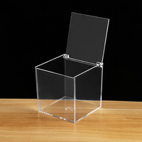 La nouvelle boîte en plastique de stockage à rabat en acrylique carré transparent en polystyrène peut être utilisée pour l'emballage de bijoux, cadeaux et autres articles