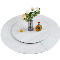 Table à manger ronde en marbre naturel de luxe avec plateau tournant pour villas haut de gamme, style crème, minimaliste italien blanc