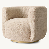 Fauteuil barillet moderne pour salon avec revêtement en peau de mouton, base métallique durable, design pivotant pour usage de loisirs dans les hôtels et appartements