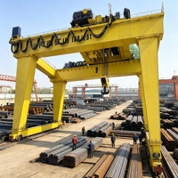 Promotion : Grue portique à double poutre montée sur rail, renforcée, résistante au vent, 25 tonnes, pour opération en cour préfabriqué de grande envergure