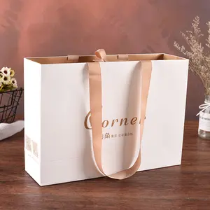 Bolsa de papel Kraft personalizada, bolso de compras de lujo con tu logotipo, color marrón