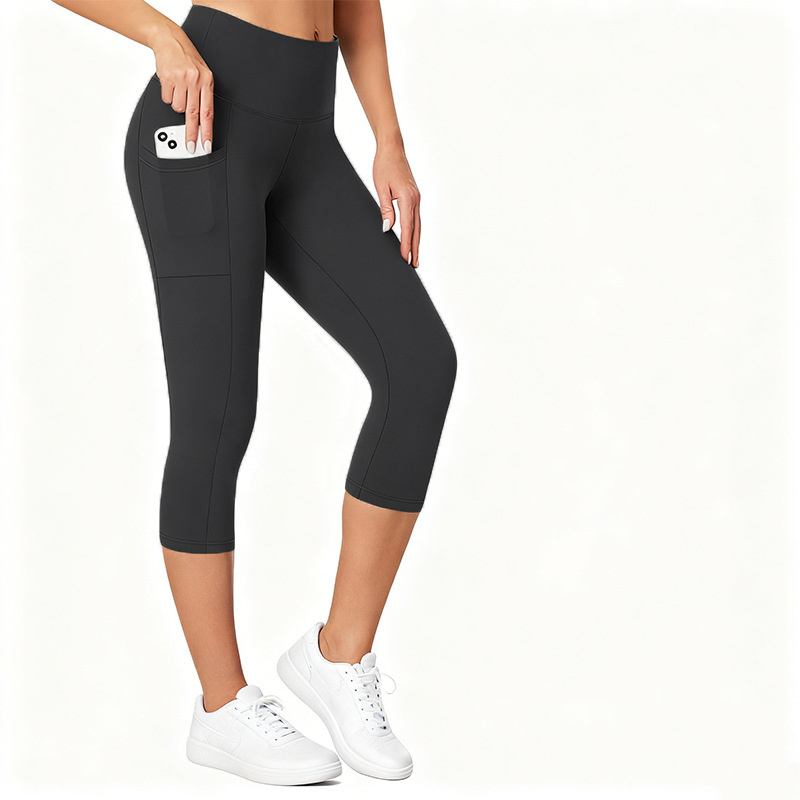 OEM/ODM Women's Solid Yoga Capris Running Tummy Control High Waist Workout Leggings with Pockets