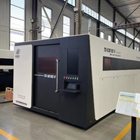 Machine de découpe laser fibre pour métaux 3015 entièrement fermée avec table d'échange, 12 kW 20 kW, haute vitesse, avec servomoteur Yaskawa et HIWIN