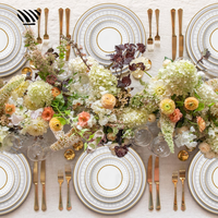 Ensemble d'assiettes en céramique gris-or élégantes motifs sophistiqués pour une décoration de table de mariage de luxe classique raffinée