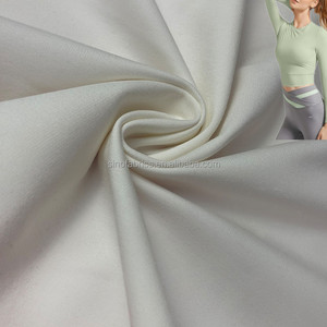 280G*1.7 Polyester Spandeks Pamuk Benzeri Serin Dokunuşlu Yoga Kumaşı Mat Çift Taraflı Fırçalanmış Nefes Alabilen Delikli Jakarlı Buz İpek Hissi - Product Image 1