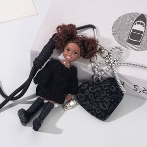 พวงกุญแจตุ๊กตาแฟชั่นสุดหรู HECION ตุ๊กตาเจ้าหญิงไฮยา เคลลี่ ผิวสีน้ำตาล สำหรับของเล่น เสื้อสเวตเตอร์สีดำ เคลลี่ พวงกุญแจ - Product Image 3