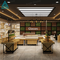 Élégant présentoir à lunettes en acrylique avec éclairage LED, robuste, écologique et rotatif pour magasin d'optique