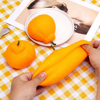 Stressverlichtende speelgoedjes Creatieve fruitspeelgoedjes Langzaam terugverende stressverminderende simulatie Oranje knijp- en muziek-speelgoedjes