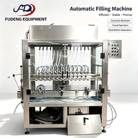 Machine de remplissage linéaire pneumatique automatique d'occasion prête à l'emploi pour la production de liquides (boissons, huiles, cosmétiques, produits chimiques, aliments)