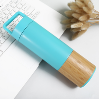 Bouteille isotherme de voyage en acier inoxydable 550 ml avec poignée en bambou, personnalisable, anti-fuite, sans BPA, avec couvercle