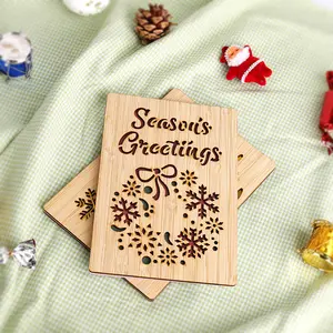 Nuevo diseño hecho a mano corte láser papel regalo bambú Navidad tarjetas de felicitación
