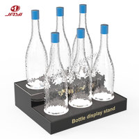 Support de présentation de bouteilles de liqueur JAYI sur mesure, support en acrylique pour bouteilles de vin avec lumière LED