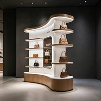 Étagère murale de luxe pour sacs à main et chaussures pour femmes avec éclairage LED, design personnalisable pour boutique de cadeaux