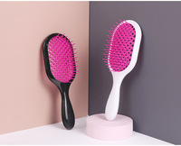 Brosse à cheveux démêlante imperméable pour femmes avec logo personnalisé, fonction de massage, poils en nylon, design rond - OEM/ODM disponible