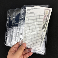 Classeur A6 à double poches à ouverture latérale, enveloppes transparentes sans zip pour 6 classeurs à anneaux.