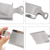 Éplucheur et presse-ail en forme de spatule pour gingembre et ail