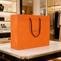 Sacs en papier orange réutilisables pour boutique de vêtements de luxe sur mesure, emballage cadeau, sacs de transport, avec votre propre logo