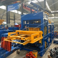Vente chaude Ligne de production de briques entièrement automatique Machine à briques de pavage hydraulique colorées Machine à fabriquer des blocs creux en ciment