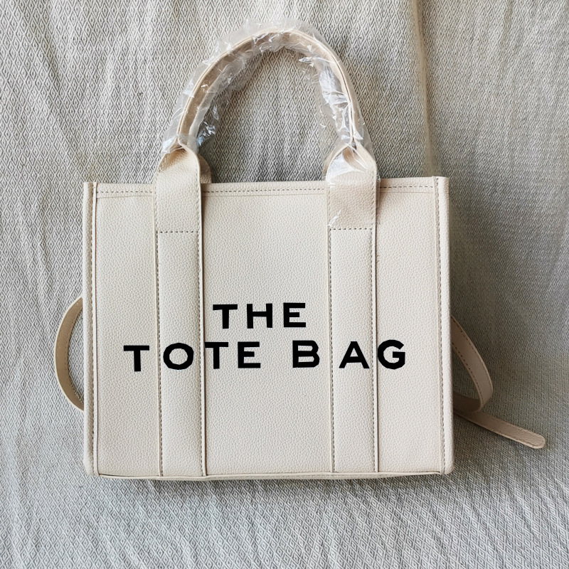 [due righe di testo - beige - stampato in nero]
