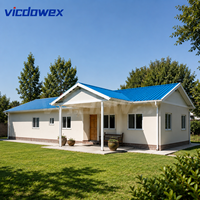 VICDOWEX Maison préfabriquée contemporaine en structure acier de type T, avec isolation thermique et caractéristiques ignifuges, pour personnel de luxe