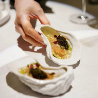 Vaisselle en céramique blanche de haute qualité en gros assiette irrégulière en céramique bols d'huîtres d'oursins pour restaurant